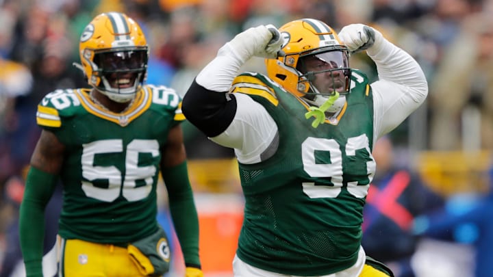 Green Bay Packers defensive tackle T.J. Slaton (93) celebrates making a tackle in the first quarter against the Chicago Bears during their football game Sunday, January 5, 2025, at Lambeau Field in Green Bay, Wisconsin.