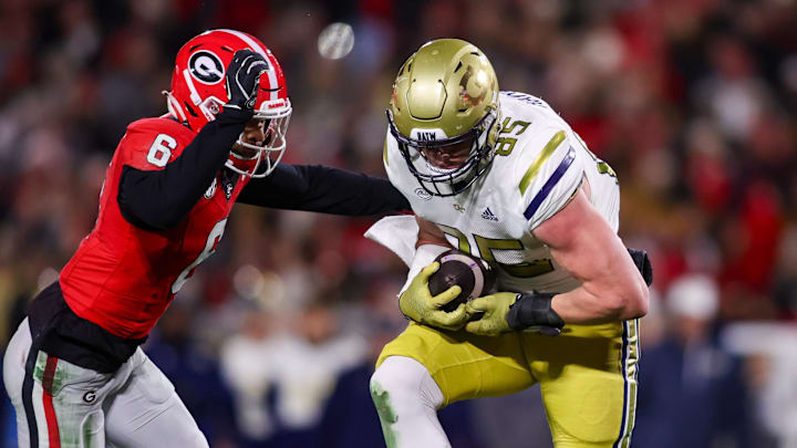 Nov 29, 2024; Athens, Georgia, USA; Georgia Tech Yellow Jackets tight end Jackson Hawes (85) catches a pass over Georgia Bulldogs defensive back Daylen Everette (6) in the second quarter Nov 29, 2024; Athens, Georgia, USA; Georgia Tech Yellow Jackets tight end Jackson Hawes (85) catches a pass over Georgia Bulldogs defensive back Daylen Everette (6) in the second quarter