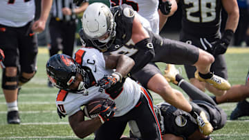 Oregon Ducks defensive back Dillon Thieneman brings down Oregon State Beavers running back Anthony Hankerson as the Oregon Ducks host the Oregon State Beavers Sept. 20, 2025, at Autzen Stadium in Eugene, Oregon.