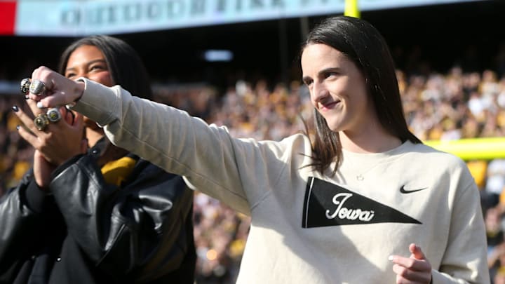 Iowa women’s basketball’s Caitlin Clark shows off her rings during a second quarter timeout during Iowa football’s game against Northwestern Saturday, Oct. 26, 2024 at Kinnick Stadium in Iowa City, Iowa. Iowa women’s basketball’s Caitlin Clark shows off her rings during a second quarter timeout during Iowa football’s game against Northwestern Saturday, Oct. 26, 2024 at Kinnick Stadium in Iowa City, Iowa.