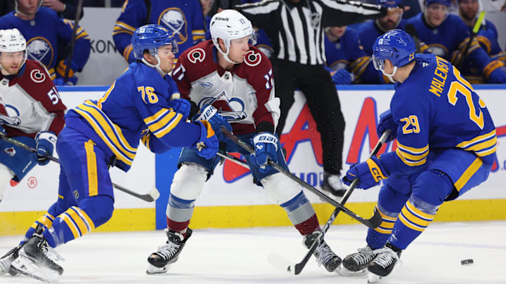 Dec 3, 2024; Buffalo, New York, USA;  Buffalo Sabres defenseman Jacob Bryson (78) checks Colorado Avalanche center Parker Kelly (17) as he makes a pass during the third period at KeyBank Center. Mandatory Credit: Timothy T. Ludwig-Imagn Images