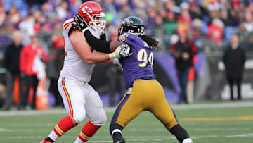 Dec 20, 2015; Baltimore, MD, USA; Baltimore Ravens ZaDarius Smith (90) is blocked by Kansas City Chiefs tackle Eric Fisher (72) at M&T Bank Stadium. Mandatory Credit: Mitch Stringer-Imagn Images