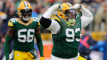 Green Bay Packers defensive tackle T.J. Slaton (93) celebrates making a tackle in the first quarter against the Chicago Bears during their football game Sunday, January 5, 2025, at Lambeau Field in Green Bay, Wisconsin.