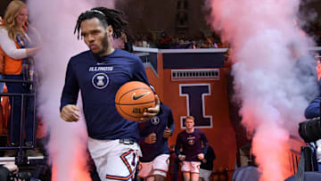 Jan 27, 2024; Champaign, Illinois, USA;  Illinois Fighting Illini forward Ty Rodgers (20) leads