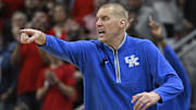 Nov 11, 2025; Louisville, Kentucky, USA;  Kentucky Wildcats head coach Mark Pope calls out instructions during the second half against the Louisville Cardinals at KFC Yum! Center. Louisville defeated Kentucky 96-88. Mandatory Credit: Jamie Rhodes-Imagn Images