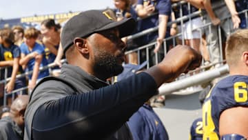 Sep 14, 2024; Ann Arbor, Michigan, USA;  Michigan Wolverines head coach Sherrone Moore walks off the field after a game against the Arkansas State Red Wolves at Michigan Stadium. Mandatory Credit: Rick Osentoski-Imagn Images