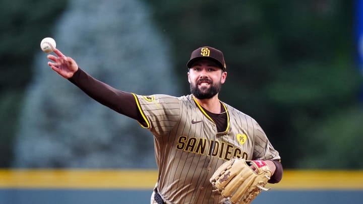 Aug 16, 2024; Denver, Colorado, USA; San Diego Padres starting pitcher Matt Waldron (61) delivers a pitch in the first inning against the Colorado Rockies at Coors Field. Mandatory Credit: Ron Chenoy-USA TODAY Sports