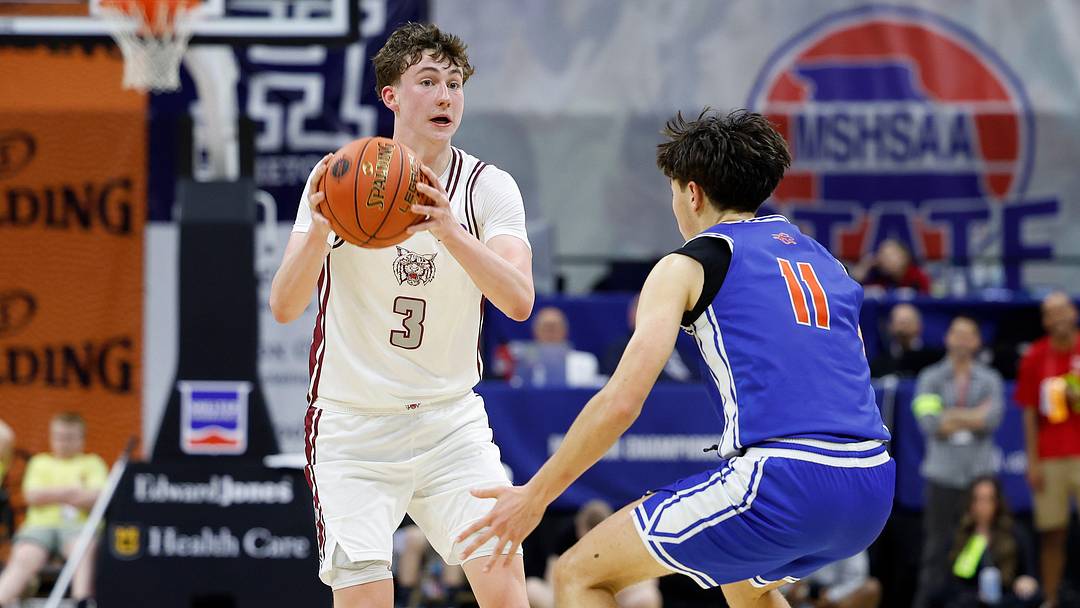 Logan-Rogersville's Chase Branham (3) looks to pass defended by Clayton's Matthew Hurst (11) during the Class 4 state championship game on March 21, 2026, at Mizzou Arena in Columbia, Missouri.