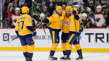 Nov 4, 2025; Saint Paul, Minnesota, USA; Nashville Predators center Steven Stamkos (91) celebrates with teammates after scoring on the Minnesota Wild with just 0.3 seconds left in the third period at Grand Casino Arena. Mandatory Credit: Matt Blewett-Imagn Images