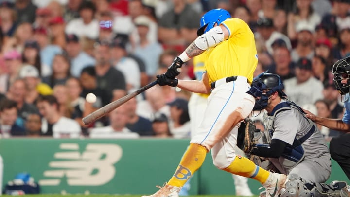 Jul 27, 2024; Boston, Massachusetts, USA; Boston Red Sox left fielder Tyler O'Neill (17) hits a home run against the New York Yankees during the fifth inning at Fenway Park. Mandatory Credit: Gregory Fisher-USA TODAY Sports