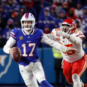 Buffalo Bills quarterback Josh Allen (17) and Kansas City Chiefs defensive tackle Chris Jones (95).