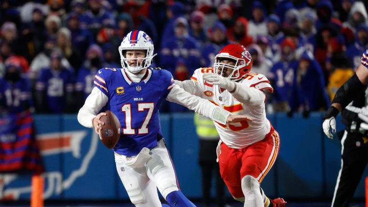 Buffalo Bills quarterback Josh Allen (17) and Kansas City Chiefs defensive tackle Chris Jones (95).