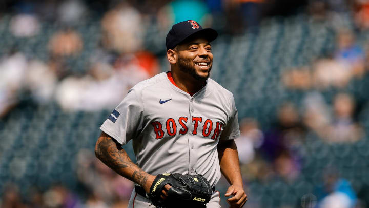 Jul 24, 2024; Denver, Colorado, USA; Boston Red Sox first baseman Dominic Smith (2) reacts after pitching in the eighth inning against the Colorado Rockies at Coors Field. Mandatory Credit: Isaiah J. Downing-USA TODAY Sports