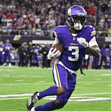 Oct 23, 2023; Minneapolis, Minnesota, USA; Minnesota Vikings wide receiver Jordan Addison (3) runs with the ball as San Francisco 49ers linebacker Fred Warner (54) pursues during the game at U.S. Bank Stadium.