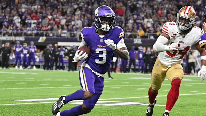 Oct 23, 2023; Minneapolis, Minnesota, USA; Minnesota Vikings wide receiver Jordan Addison (3) runs with the ball as San Francisco 49ers linebacker Fred Warner (54) pursues during the game at U.S. Bank Stadium.