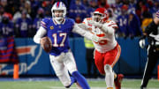 Buffalo Bills quarterback Josh Allen (17) has to scramble away from Kansas City Chiefs defensive tackle Chris Jones (95).