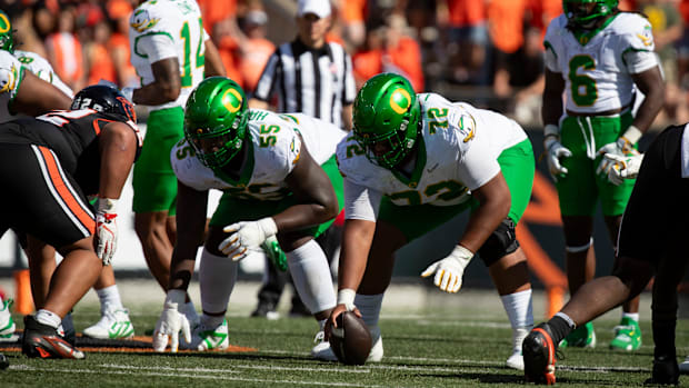 Oregon offensive lineman Iapani Laloulu lines up to snap the ball as the Oregon State Beavers host the Oregon Ducks