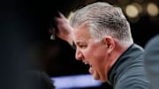 Purdue Boilermakers head coach Matt Painter leads a timeout 