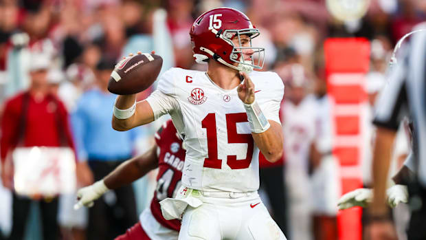 Ty Simpson throws the ball