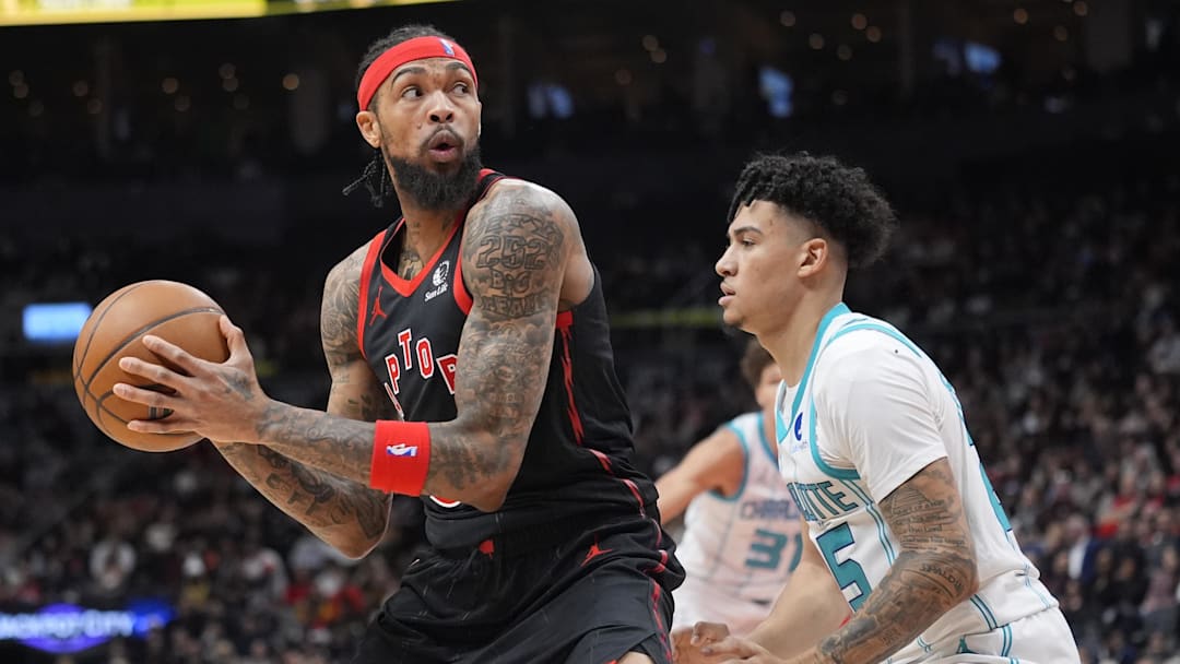 Dec 5, 2025; Toronto, Ontario, CAN; Toronto Raptors forward Brandon Ingram (3) looks to make a play as Charlotte Hornets guard KJ Simpson (25) defends during the first half at Scotiabank Arena. Mandatory Credit: John E. Sokolowski-Imagn Images