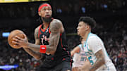 Dec 5, 2025; Toronto, Ontario, CAN; Toronto Raptors forward Brandon Ingram (3) looks to make a play as Charlotte Hornets guard KJ Simpson (25) defends during the first half at Scotiabank Arena. Mandatory Credit: John E. Sokolowski-Imagn Images