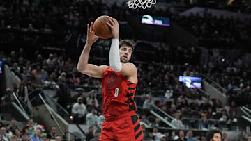 Dec 21, 2024; San Antonio, Texas, USA;  Portland Trail Blazers forward Deni Avdija (8) rebounds a ball against the San Antonio Spur in the second half at Frost Bank Center. Mandatory Credit: Daniel Dunn-Imagn Images