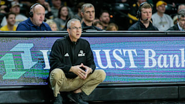 Mar 2, 2024; Wichita, Kansas, USA; Rice Owls Scott Pera watches game play during the second half against the Wichita State Shockers at Charles Koch Arena. 