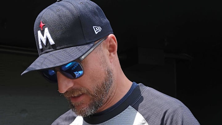 Apr 17, 2024; Baltimore, Maryland, USA; Minnesota Twins manager Rocco Baldelli (5) signs an autograph prior to the game against the Baltimore Orioles at Oriole Park at Camden Yards. Mandatory Credit: Mitch Stringer-Imagn Images