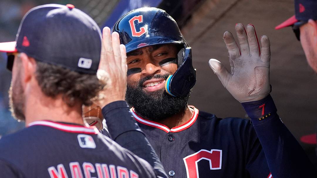 Sep 13, 2026; Minneapolis, Minnesota, USA;  Cleveland Guardians designated hitter Jo Adell (7) celebrates his run against the Minnesota Twins on a double by left fielder Angel Martinez (not pictured) in the ninth inning at Target Field.  Mandatory Credit: Bruce Kluckhohn-Imagn Images