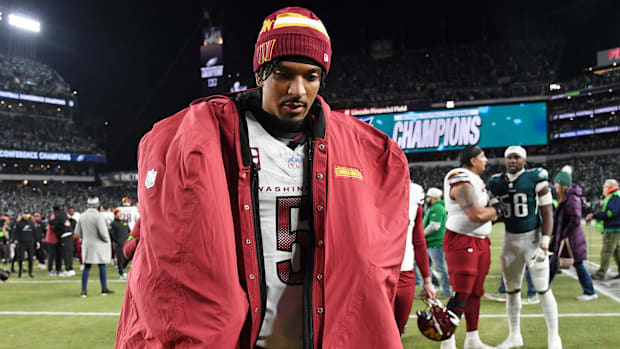 Washington Commanders quarterback Jayden Daniels (5) walks off the field after losing the NFC Championship game