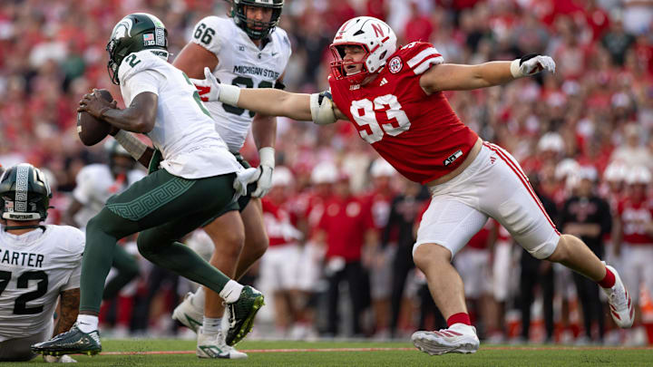 Oct 4, 2025; Lincoln, Nebraska, USA; Nebraska Cornhuskers defensive lineman Kade Pietrzak (93) pressures Michigan State Spartans quarterback Aidan Chiles (2) at Memorial Stadium.