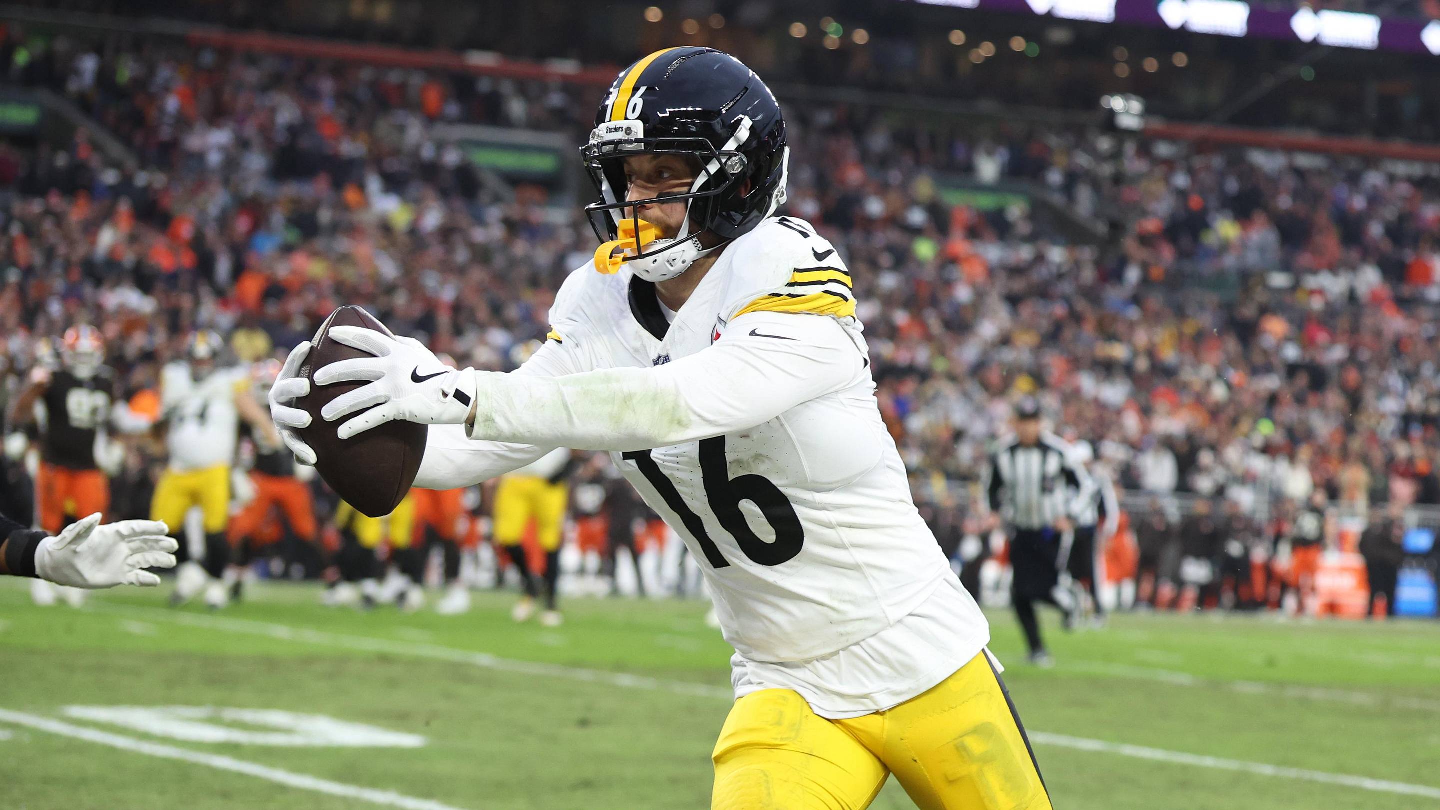 Dec 28, 2025; Cleveland, Ohio, USA; Pittsburgh Steelers wide receiver Adam Thielen (16) runs with the ball after a catch in the fourth quarter against the Cleveland Browns at Huntington Bank Field. Mandatory Credit: Scott Galvin-Imagn Images