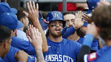Jun 8, 2025; Chicago, Illinois, USA; Kansas City Royals designated hitter Bobby Witt Jr. (7) celebrates with teammates in the dugout after hitting a two-run home run against the Chicago White Sox during the ninth inning at Rate Field. Mandatory Credit: Kamil Krzaczynski-Imagn Images