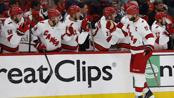 May 15, 2025; Washington, District of Columbia, USA; Carolina Hurricanes center Jordan Staal (11) celebrates with teammates after scoring a goal against the Washington Capitals in the first period in game five of the second round of the 2025 Stanley Cup Playoffs at Capital One Arena. Mandatory Credit: Geoff Burke-Imagn Images