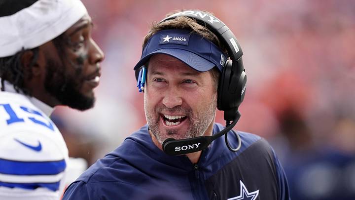 Oct 26, 2025; Denver, Colorado, USA; Dallas Cowboys head coach Brian Schottenheimer reacts in the first half against the Denver Broncos at Empower Field at Mile High. Mandatory Credit: Ron Chenoy-Imagn Images