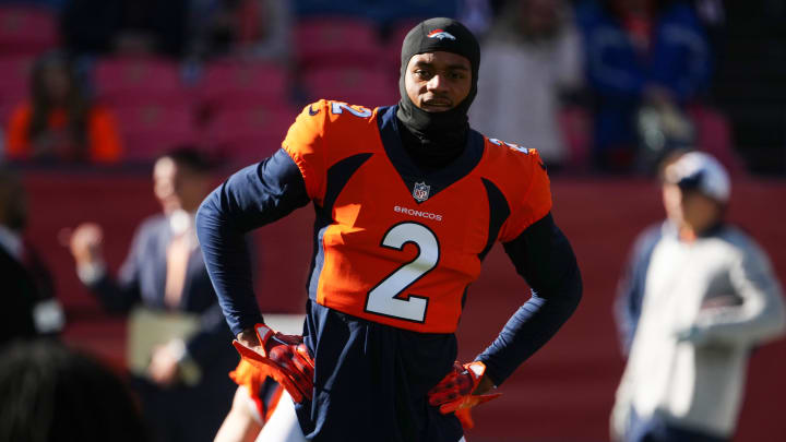 Nov 26, 2023; Denver, Colorado, USA;  Denver Broncos cornerback Pat Surtain II (2) stretches before the game against the Cleveland Browns at Empower Field at Mile High. Mandatory Credit: Ron Chenoy-USA TODAY Sports