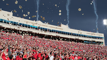 Aug 30, 2025; Lubbock, Texas, USA;  The Texas Tech Red Raiders student body throw tortillas at the kickoff of the game against the Arkansas-Pine Bluff Golden Lions at Jones AT&T Stadium. Mandatory Credit: Michael C. Johnson-Imagn Images