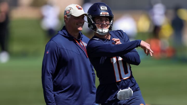 May 23, 2024; Englewood, CO, USA; Denver Broncos quarterback Bo Nix (10) during organized team activities at Centura Health Training Center with OC Joe Lombardi observing. 