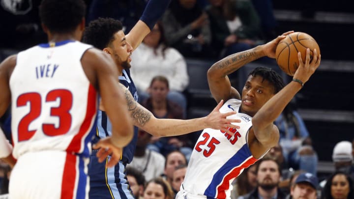 Apr 5, 2024; Memphis, Tennessee, USA; Detroit Pistons guard Marcus Sasser (25) passes the ball to Detroit Pistons guard Jaden Ivey (23) as Memphis Grizzlies guard Scotty Pippen Jr. (1) defends during the second half at FedExForum. Mandatory Credit: Petre Thomas-USA TODAY Sports