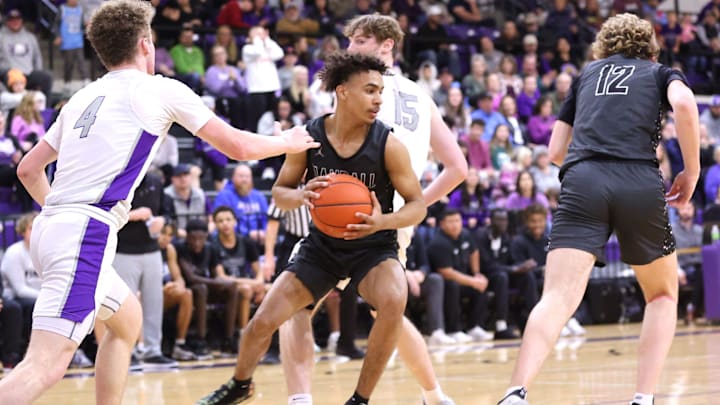 Randall   s KJ Thomas (5) secures a defensive rebound in a District 4-4A game against Canyon, Friday night, January 5, 2024, at Canyon High School, in Canyon, Texas. Randall won 58-40.