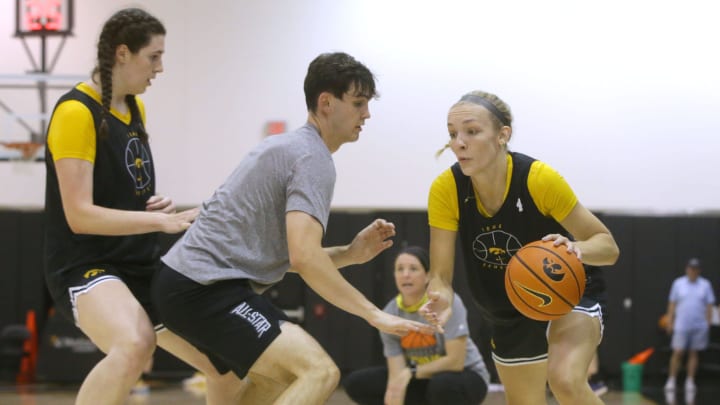 Iowa’s Kylie Feuerbach, 4, dribbles during practice Thursday, July 11, 2024 at Carver-Hawkeye Arena in Iowa City, Iowa.