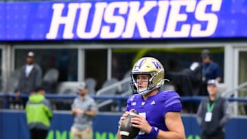 Sep 14, 2024; Seattle, Washington, USA; Washington Huskies quarterback Will Rogers (7) during warmups before the game against the Washington State Cougars at Lumen Field. Mandatory Credit: Steven Bisig-Imagn Images