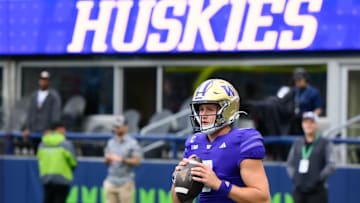 Sep 14, 2024; Seattle, Washington, USA; Washington Huskies quarterback Will Rogers (7) during warmups before the game against the Washington State Cougars at Lumen Field. Mandatory Credit: Steven Bisig-Imagn Images