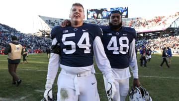 Penn State Nittany Lions defensive tackle Robert Windsor (54) and defensive end Shareef Miller (48)