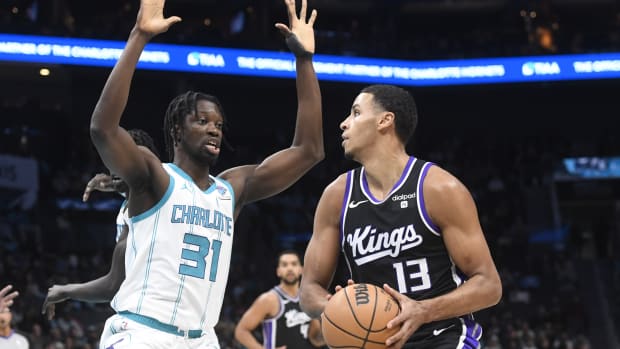 Jan 10, 2024; Charlotte, North Carolina, USA; Sacramento Kings forward Keegan Murray (13) looks to shoot as he is defended.