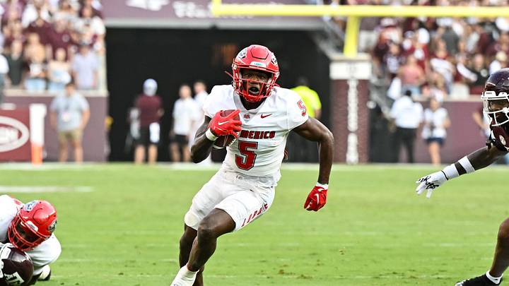 Sep 2, 2023; College Station, Texas, USA; New Mexico Lobos running back Jacory Croskey-Merritt (5) runs the ball during the first half against the Texas A&M Aggies at Kyle Field. Mandatory Credit: Maria Lysaker-USA TODAY Sports