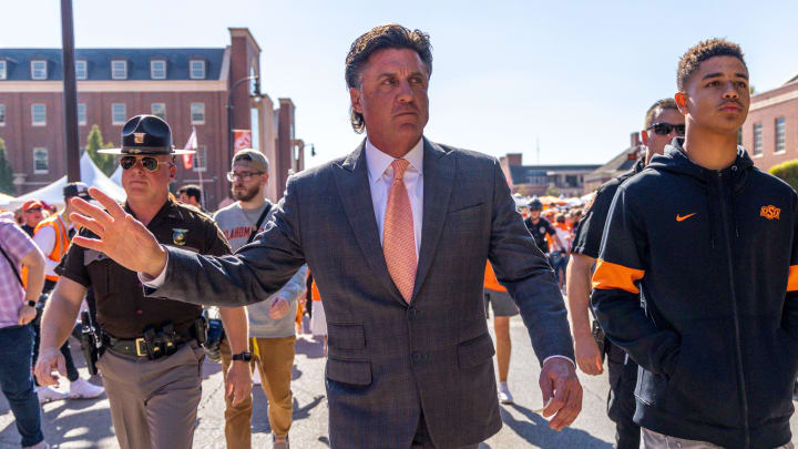 Mike Gundy walks to the stadium before a Bedlam college football game between the Oklahoma State University Cowboys (OSU) and the University of Oklahoma Sooners (OU) at Boone Pickens Stadium in Stillwater, Okla., Saturday, Nov. 4, 2023.