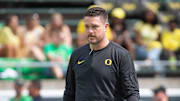 Oregon head coach Dan Lanning walks the field as the Oregon Ducks warm up to host Portland State in the Ducks' season opener Saturday, Sept. 2, 2023, at Autzen Stadium in Eugene, Ore.