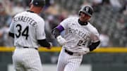 Colorado Rockies third base Ryan McMahon (24) runs off a two run home run in the first inning against the Detroit Tigers at Coors Field on May 7.