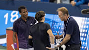 Aug 16, 2024; Cincinnati, OH, USA; Felix Auger-Aliassime of Canada and Jack Draper of Great Britain meet at the net after a controversial match-ending point is explained by ATP Tour supervisor Roland Herbal on Day 5 of the Cincinnati Open.